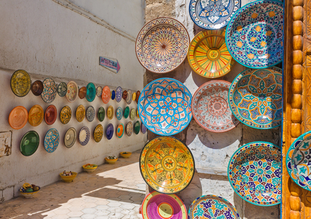 Traditional Moroccan painted clayware on the walls of the streets in Morocco.の写真素材