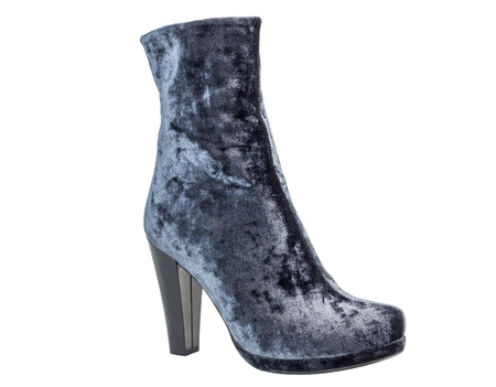 One gray suede women's boots on heels standing on white backgroundの写真素材