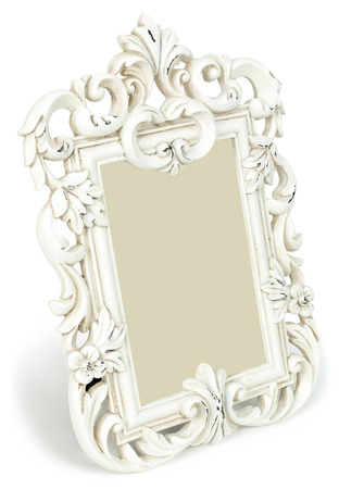 Vintage photo frame standing at an angle isolated on white background.の写真素材