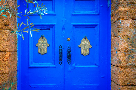 Blue door in the Moroccan town of Essaoira.の写真素材