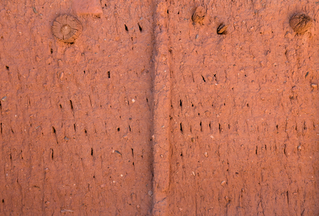 Texture cracked clay surface. Ksar Ait Ben Haddou, Moroccoの写真素材