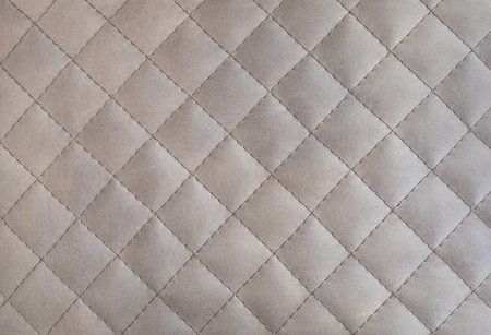 Texture of genuine leather upholstered furniture. Decorative backgroundの写真素材