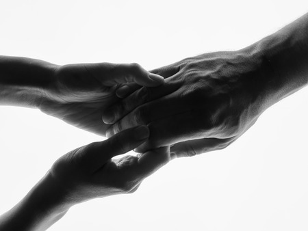 Touching hands silhouette man woman white background couple feeling love. Man woman hold hands...