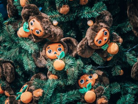 MOSCOW, Russia - December 19, 2018: Christmas tree decorated with toys Cheburashki. Christmas tree...