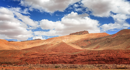 Amazing view of sandy desert at high Atlas mountains range. Moroccan landscapes with bright sun and...