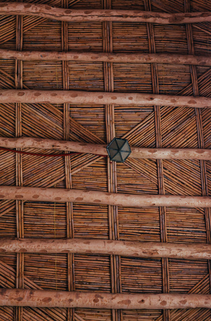 Maroccan wooden twig ceiling. Bamboo ceiling in african house. Traditional wooden ceiling in the home of the Berbersの写真素材