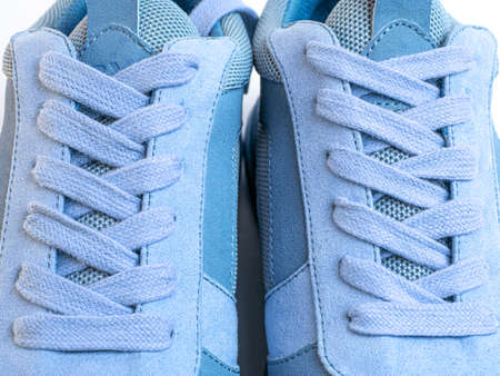 Shoestrings of blue color pattern. Closeup lacing background texture for design. Shoelaces, shoestrings or bootlaces.の写真素材
