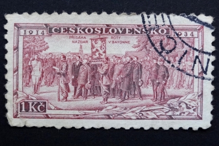 CZECHOSLOVAKIA - CIRCA 1934: Stamp printed in former CZECHOSLOVAKIA commemorates 20th anniversary of Czechoslovak Foreign Legions, French battalion enrolling at Bayonne, circa 1934のeditorial素材