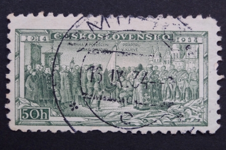 CZECHOSLOVAKIA - CIRCA 1934: Stamp printed in former CZECHOSLOVAKIA commemorates 20th anniversary of Czechoslovak Foreign Legions, Consecrating Colours at Kiev, circa 1934のeditorial素材