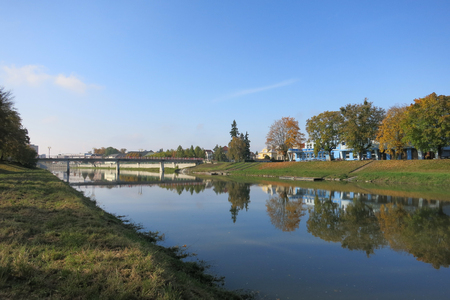 Bridge over Becva River in Prerov on a sunny dayの写真素材