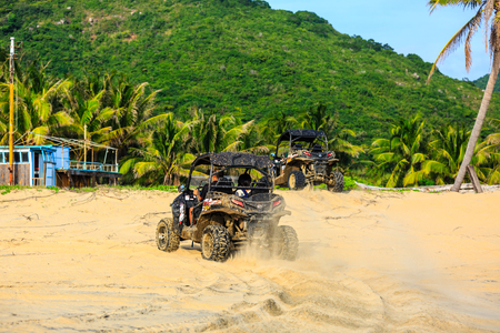 China's Hainan Nanwan Monkey Island Colorful Beach ATVのeditorial素材