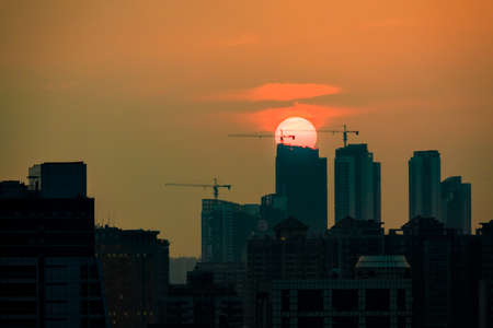 Construction site in the sunset in Guangzhou, Guangdong, Chinaのeditorial素材