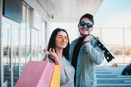 Young fashion models at shopping park.の写真素材