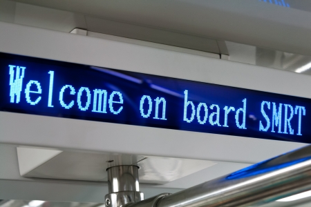 SINGAPORE - SEPTEMBER 21: Sign in Singapore Mass Rapid Transit train on September 21, 2011 in Singapore. Rapidly growing rail network had an average daily ridership of 2.406 million in 2011.のeditorial素材