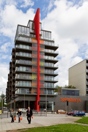 MILTON KEYNES, UK - JULY 9: Shoppers leave Sainsbury's Superstore in on July 9, 2012 in Milton Keynes. Sainsbury's is the third largest chain of supermarkets in the UK. のeditorial素材