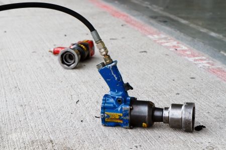 BRNO, CZECH REPUBLIC - SEPTEMBER 22: Well-used Paoli wheel gun on September 22, 2012 in Brno, Czech Republic. Dino Paoli is Italian company specialized in making impact wrenches.のeditorial素材