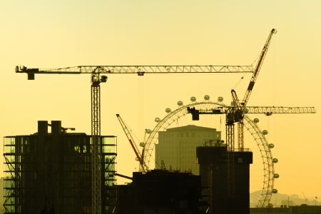 LONDON - NOVEMBER 14: Unfinished buildings and tower cranes on November 14, 2012 in London. London skyline is being constantly reshaped with construction of new skyscrapers.のeditorial素材