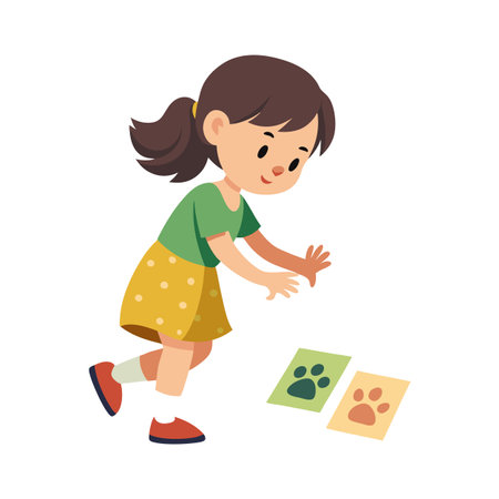 Young girl looking at animal paw prints on cards for learning activityのイラスト素材