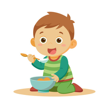 Cartoon boy in pajamas eating cereal with a spoon from a bowlのイラスト素材