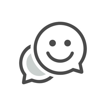 Smiling chat bubbles: A playful icon for communication and connection on a black background