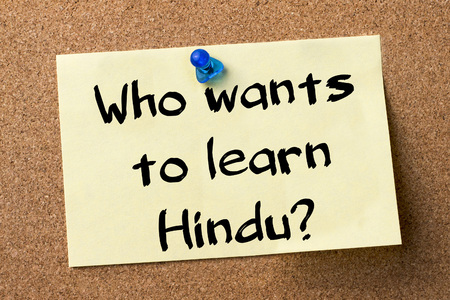 Who wants to learn Hindu? - adhesive label pinned on bulletin board - horizontal imageの写真素材
