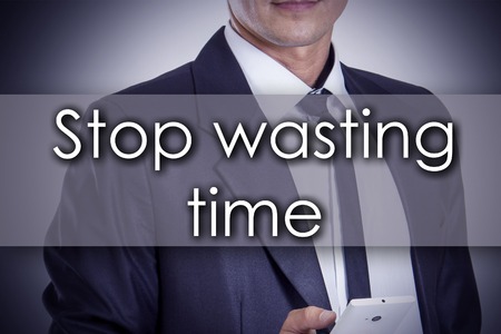 Stop wasting time - Young businessman with text - business concept - horizontal imageの写真素材