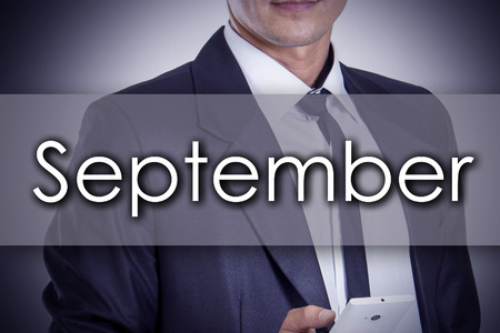 September - Young businessman with text - business concept - horizontal imageの写真素材