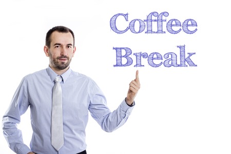 Coffee Break - Young businessman with small beard pointing up in blue shirt - horizontal imageの写真素材