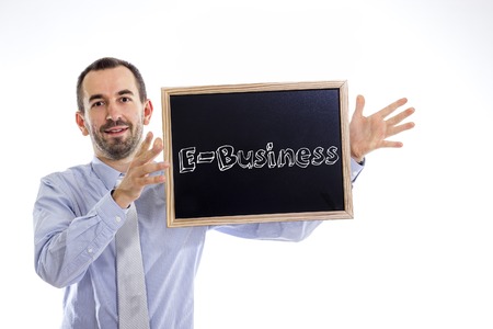 E- business - Young businessman with blackboard - isolated on white - horizontal imageの写真素材