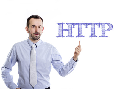 HTTP - Young businessman with small beard pointing up in blue shirt - horizontal imageの写真素材