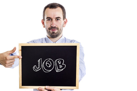 JOB - Young businessman with blackboard - isolated on white - horizontal imageの写真素材