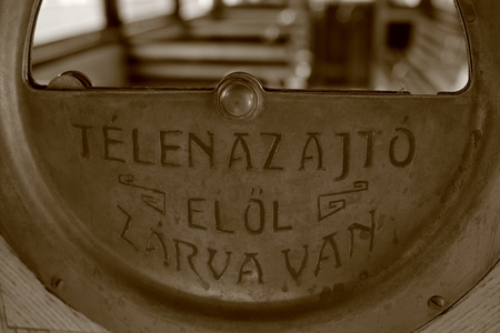 Ornamental detail of a vintage wooden streetcar ("Front door is closed in winter")の写真素材