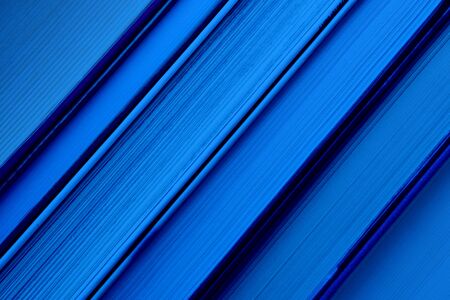 Education and reading concept - books diagonally. Classic blue - trend color of 2020の写真素材