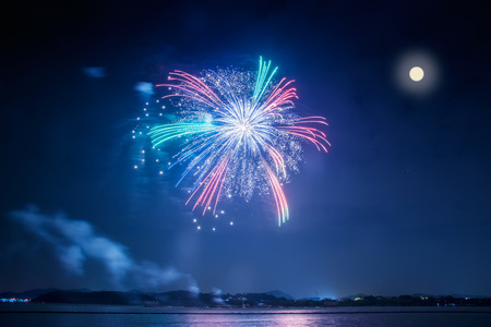 Mid Autumn Festival fireworks display the full moonの写真素材