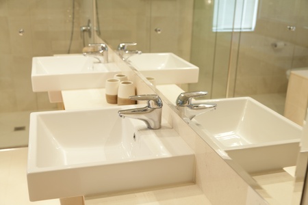 Twin sinks in modern bathroomの写真素材