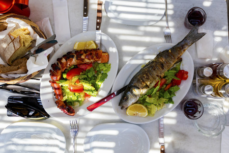 Traditional Greek  grilled seafood on tableの写真素材