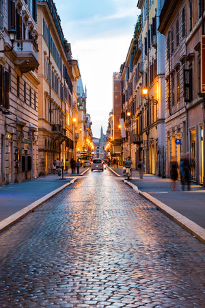 Old Roman street at sunset, Rome, Italyの写真素材