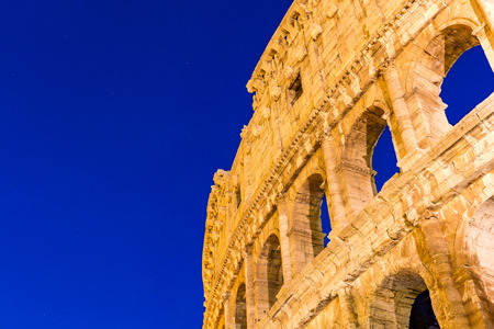 Night view of the Colosseum amphitheatre in the centre of Rome