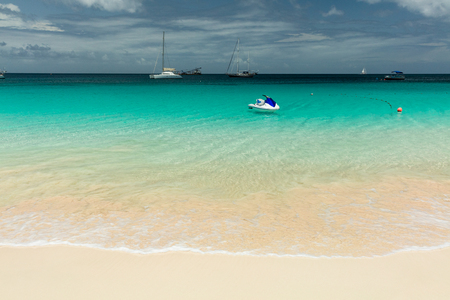 Jet ski on tropical beach in Barbados, Caribbeanの写真素材