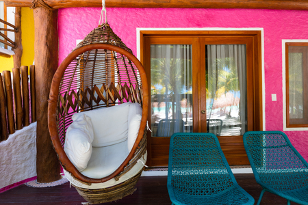 Hanging chair inside a stylish Mexican Villa, Quintana Rooのeditorial素材