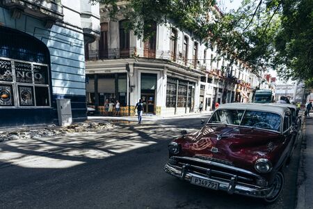 HAVANA, CUBA- October, 2018: Havana's iconic vintage cars and architecture is a main tourist...