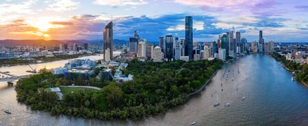 Panorama of Brisbane skyline at sunset, Australiaの写真素材