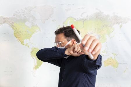 Doctor with a nasal swab used to test for possible coronavirus infectionの写真素材