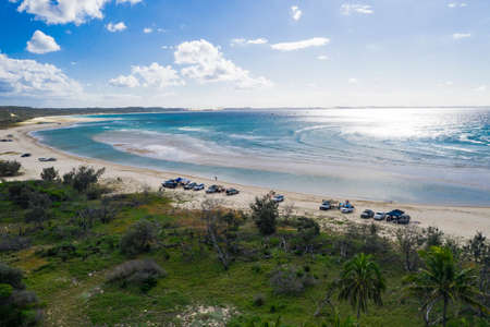 Off road cars parked on the beach at Waddy Point on Fraser Islandの写真素材