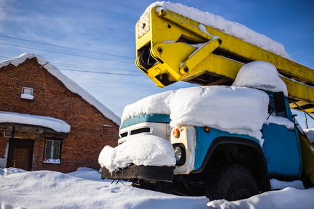 Car tower covered in several inches of snowの写真素材