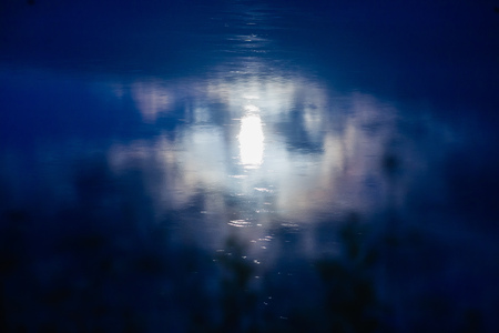 moon reflecting in misty water surface. Silence concept.の写真素材