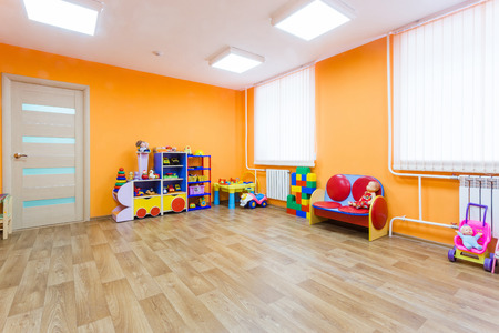 Bright orange game room in the kindergarten.の写真素材