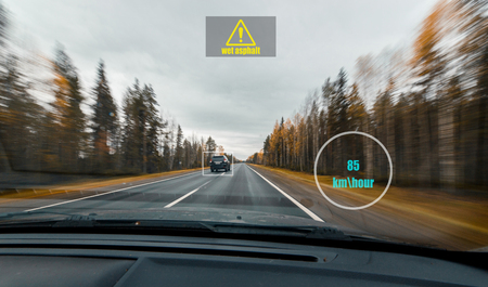 View of HUD panel with information of speed, road surface and scanning sensors at high speed drive...