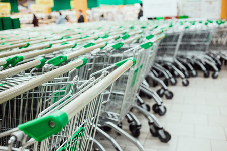 Close up a lot of shopping carts at the store.の写真素材