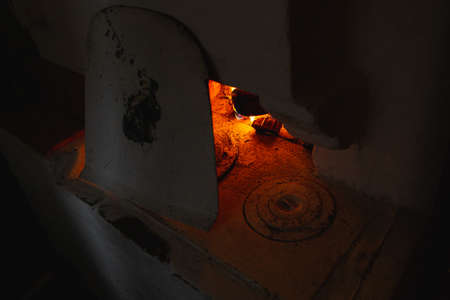 Fire hearth of russian oven in traditional village houseの写真素材